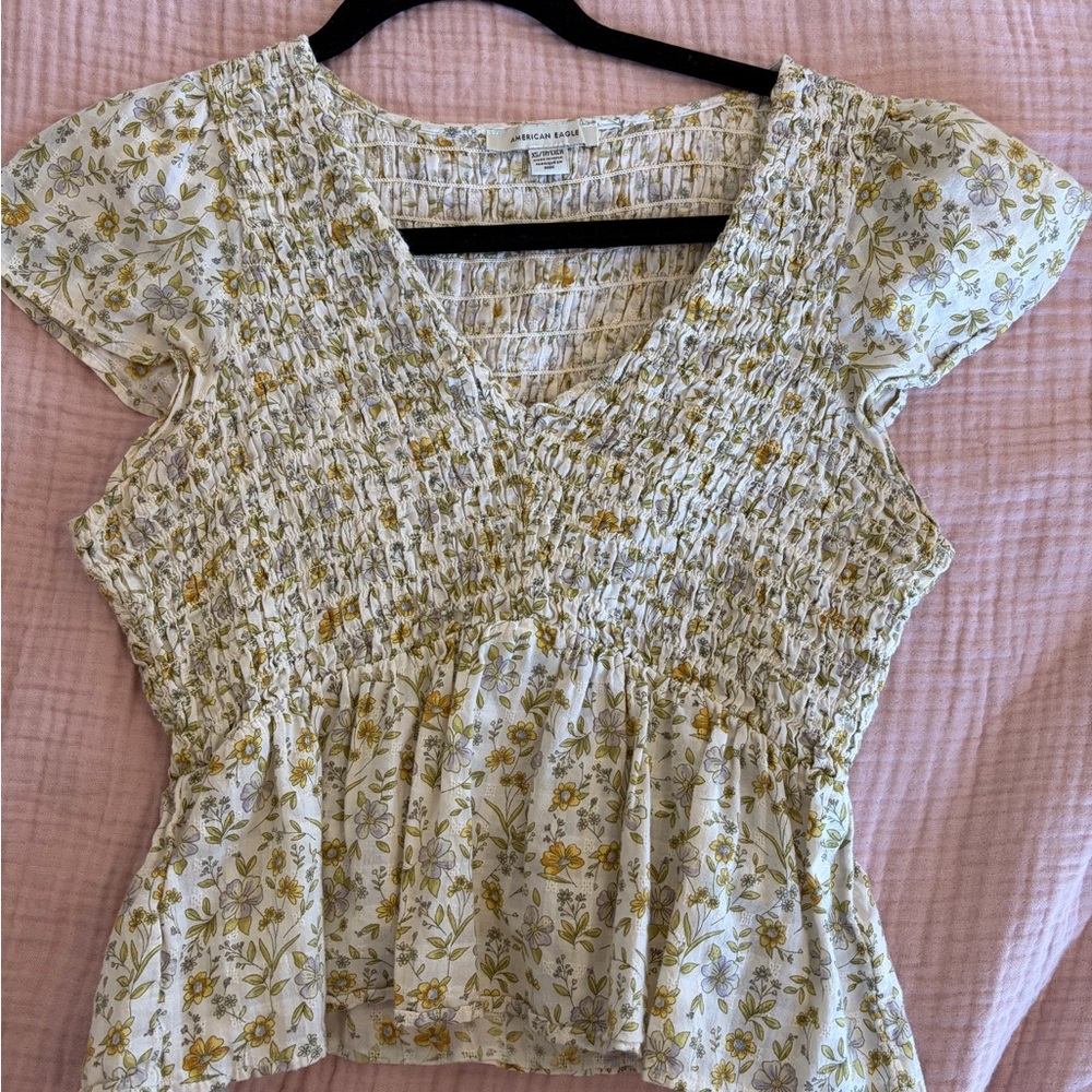 American Eagle Outfitters White Floral Smocked Peplum Top with Yellow Accents